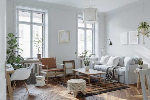 Salón moderno y luminoso con muebles y plantas, mostrando el beneficio de ganar espacio con OhMyBox.